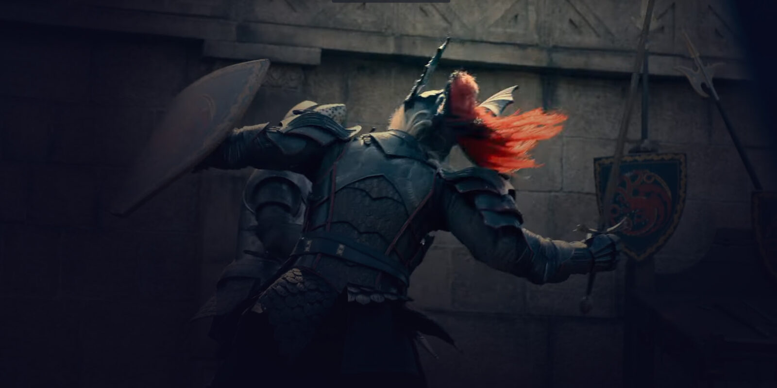 Two knights fighting while holding a sword with one hand and a shield with the other