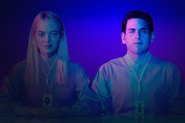 A man and a woman side by side looking in front