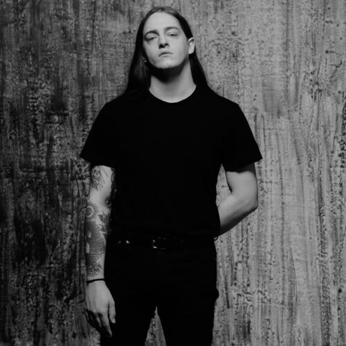 Medium shot of the artist Perturbator
