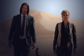 Two men walking in the desert