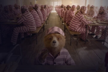 Paddington Bear in jail with other prisoners